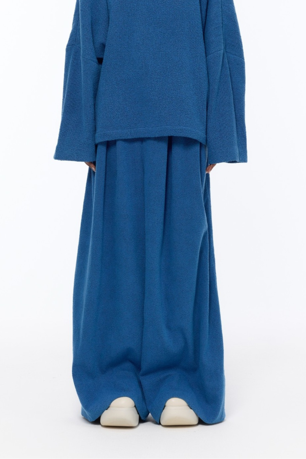 Mid Rise French Blue Bouclé Pant by Marrakshi Life, handcrafted in Marrakesh with a soft textured bouclé finish, mid-rise waist and fluid wide-leg silhouette.