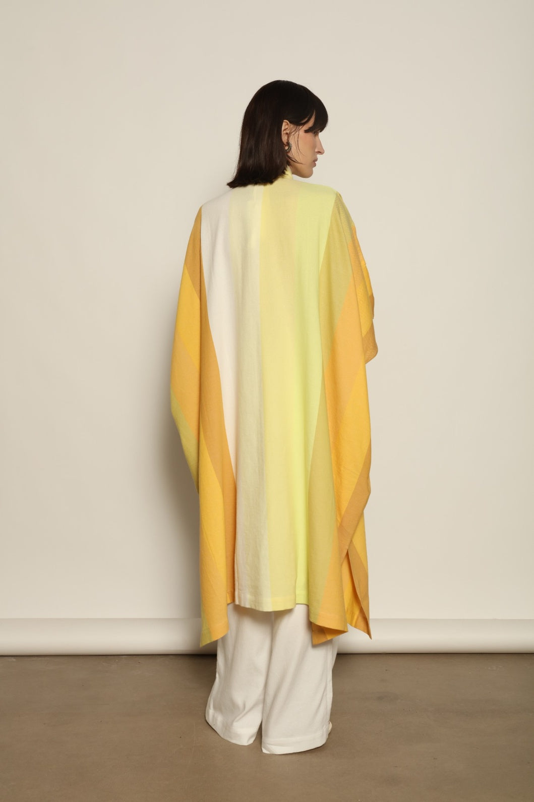 Sleeveless Caftan Stripe 44 by Marrakshi Life in 100% cotton, featuring sun-washed multicolour stripes, a clean sleeveless cut and a relaxed, fluid silhouette designed for warm-weather ease.