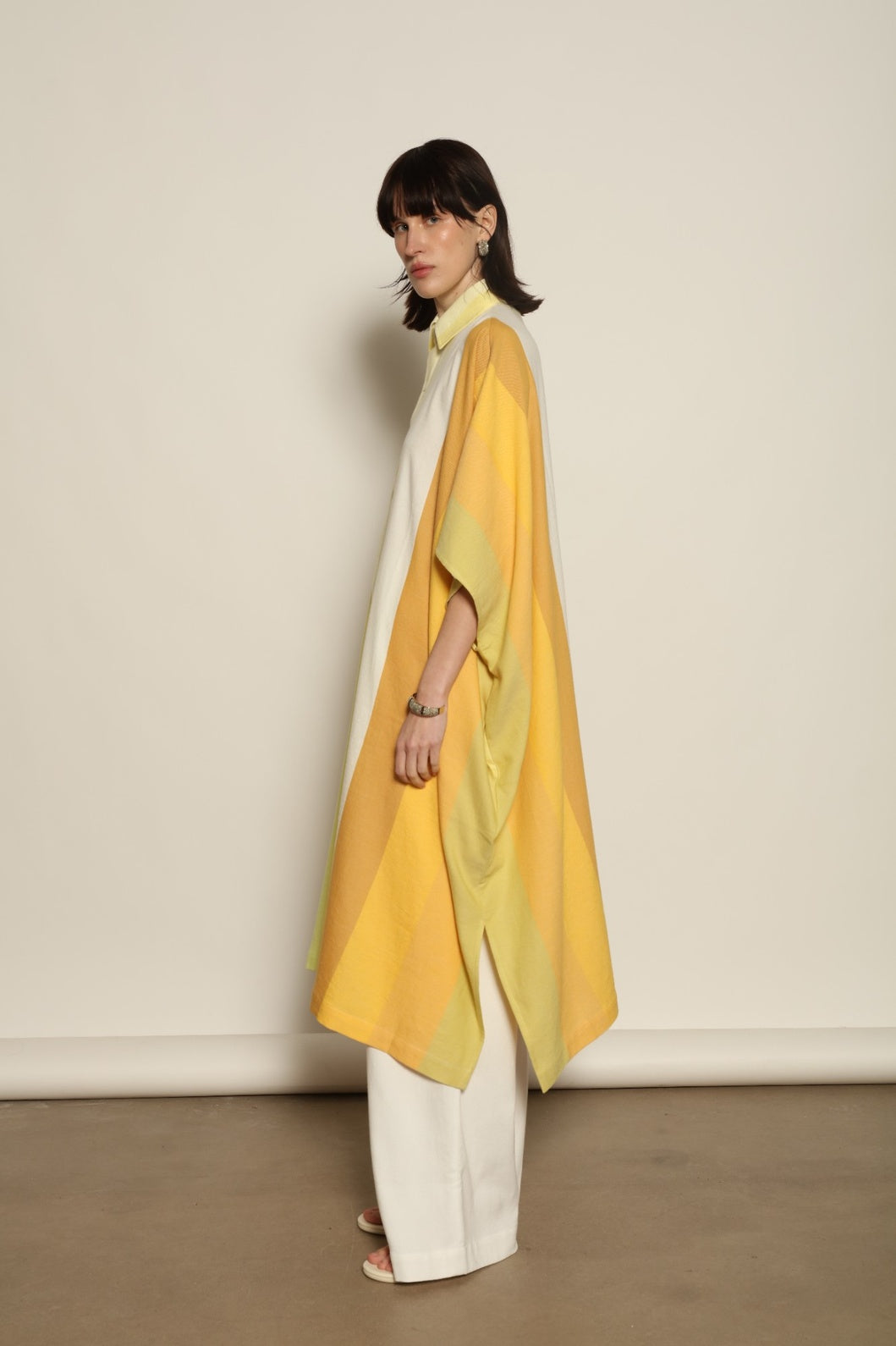 Sleeveless Caftan Stripe 44 by Marrakshi Life in 100% cotton, featuring sun-washed multicolour stripes, a clean sleeveless cut and a relaxed, fluid silhouette designed for warm-weather ease.