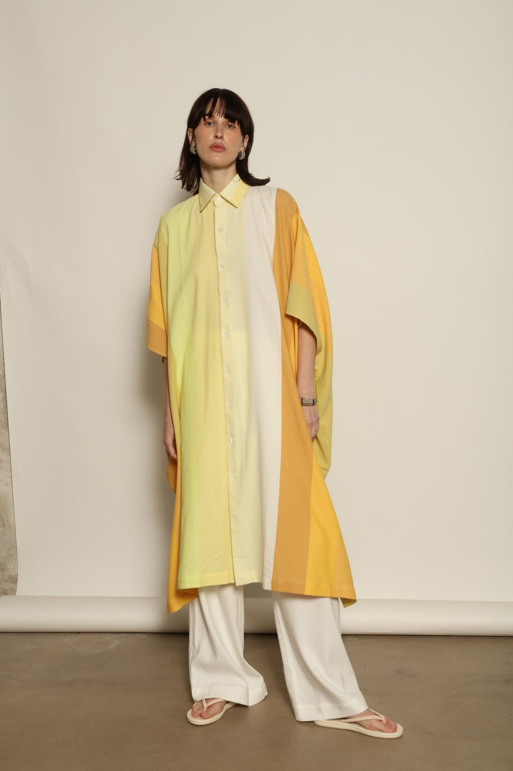 Sleeveless Caftan Stripe 44 by Marrakshi Life in 100% cotton, featuring sun-washed multicolour stripes, a clean sleeveless cut and a relaxed, fluid silhouette designed for warm-weather ease.