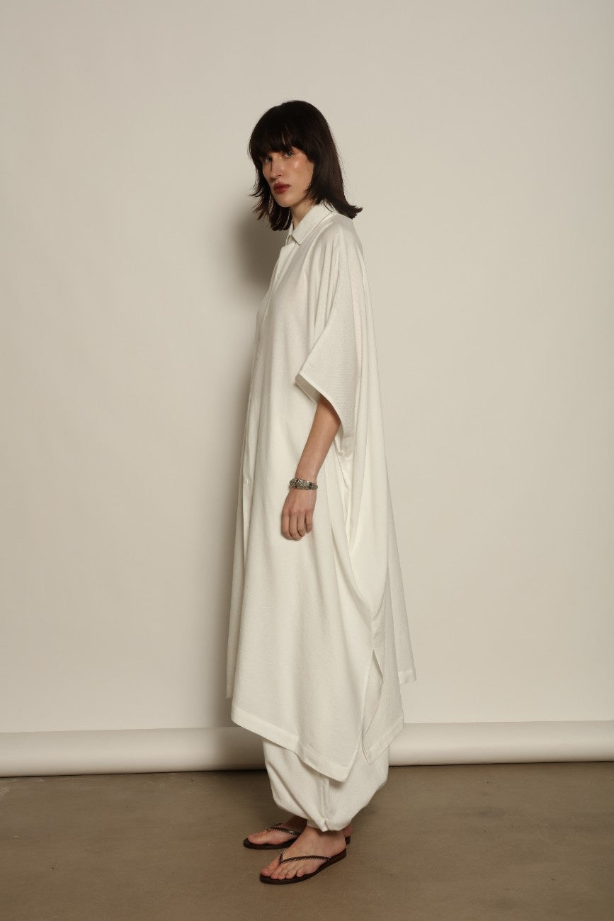 Sleeveless Caftan in White Solid by Marrakshi Life, crafted in Morocco from 100% cotton with a clean sleeveless cut, soft fluid drape and relaxed full-length silhouette.