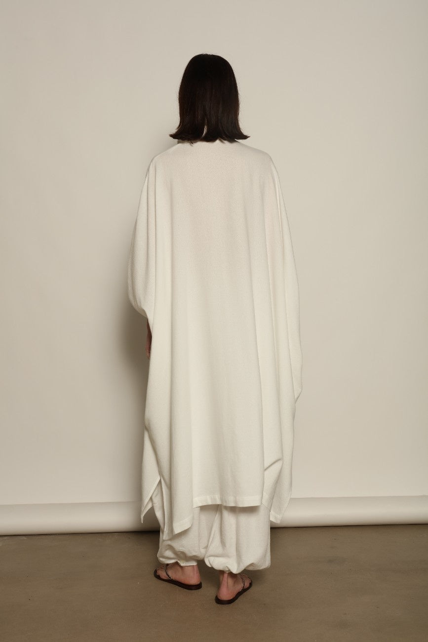 Sleeveless Caftan in White Solid by Marrakshi Life, crafted in Morocco from 100% cotton with a clean sleeveless cut, soft fluid drape and relaxed full-length silhouette.
