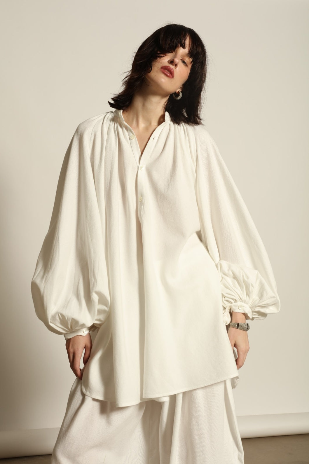 Touareg Tunic with Balloon Sleeves by Marrakshi Life in handwoven 100% cotton, featuring bold red, white and blue stripes, a Nero collar, Henley-style button placket and long balloon sleeves.
