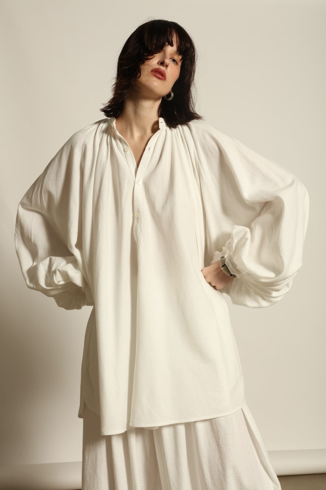 Touareg Tunic with Balloon Sleeves by Marrakshi Life in handwoven 100% cotton, featuring bold red, white and blue stripes, a Nero collar, Henley-style button placket and long balloon sleeves.