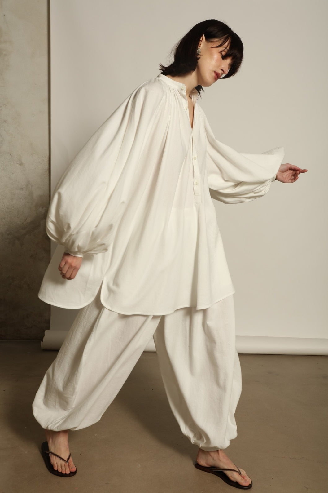 Touareg Tunic with Balloon Sleeves by Marrakshi Life in handwoven 100% cotton, featuring bold red, white and blue stripes, a Nero collar, Henley-style button placket and long balloon sleeves.