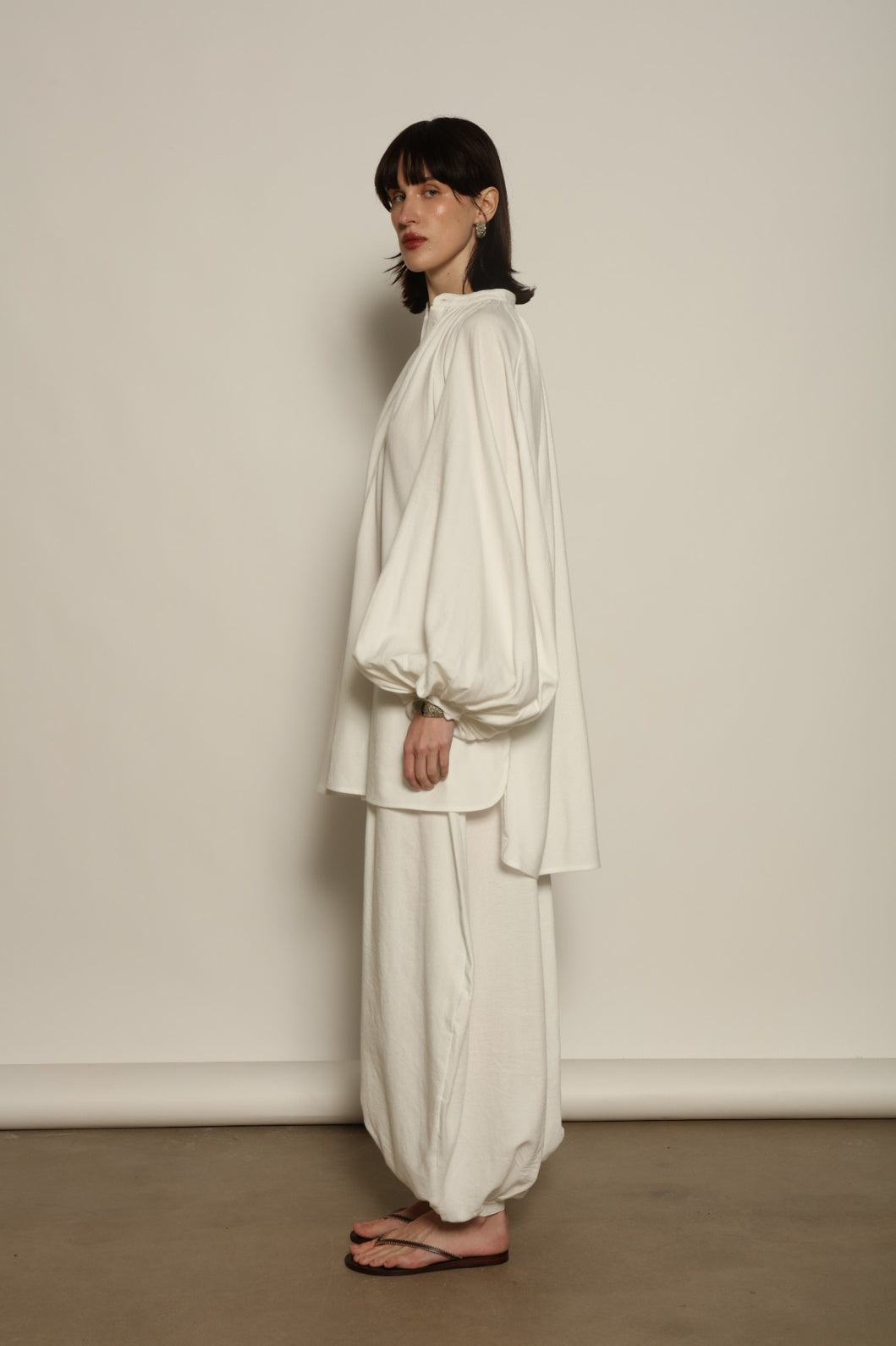 Touareg Tunic with Balloon Sleeves by Marrakshi Life in handwoven 100% cotton, featuring bold red, white and blue stripes, a Nero collar, Henley-style button placket and long balloon sleeves.