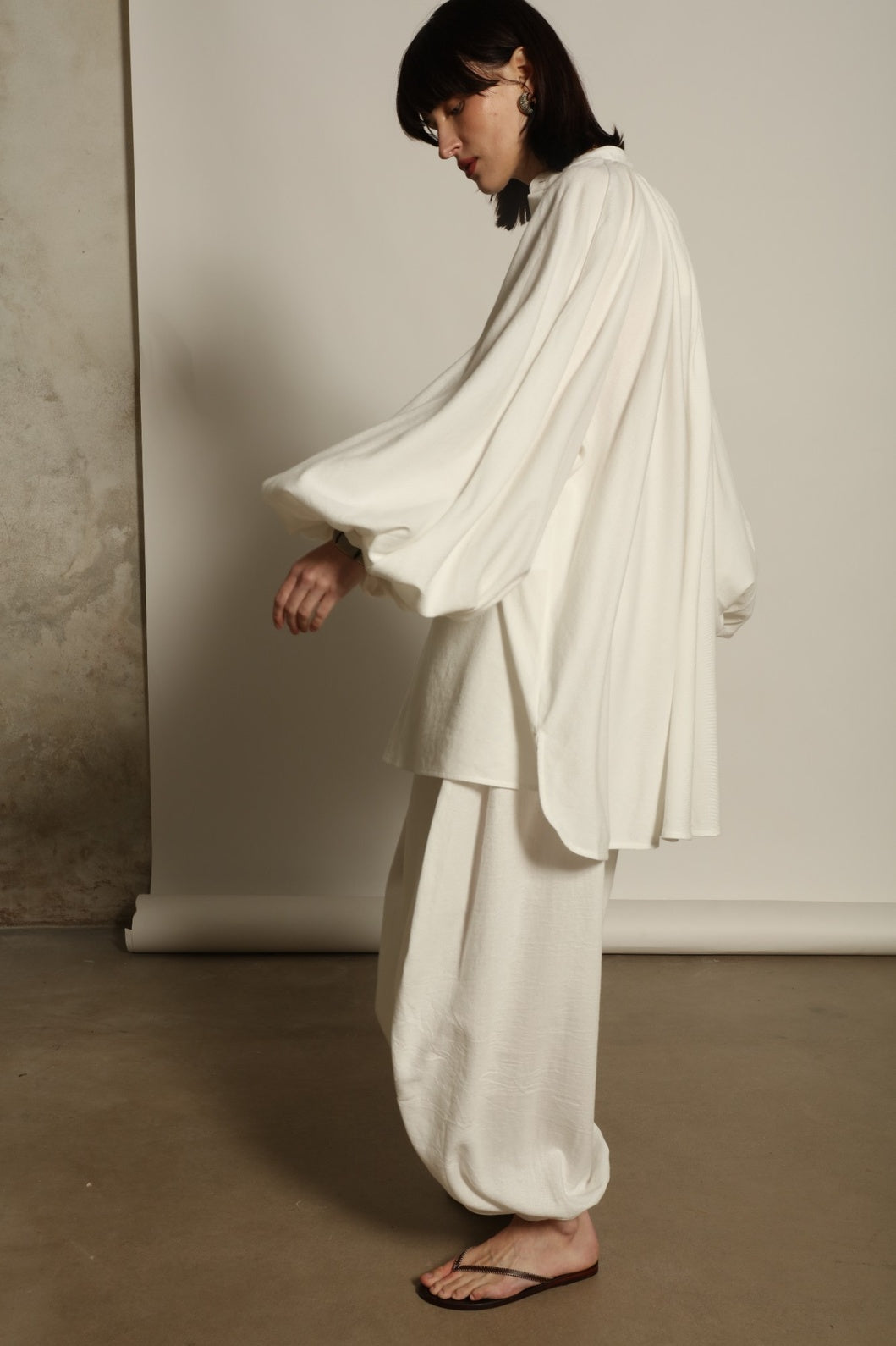 Touareg Tunic with Balloon Sleeves by Marrakshi Life in handwoven 100% cotton, featuring bold red, white and blue stripes, a Nero collar, Henley-style button placket and long balloon sleeves.