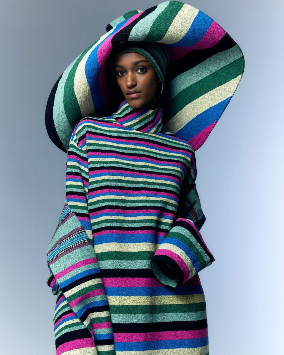 Turtleneck Multicolor Bouclé Dress by Marrakshi Life, handcrafted in Marrakesh from plush cotton bouclé with handwoven multicolour stripes, a tall turtleneck and a relaxed flowing silhouette.