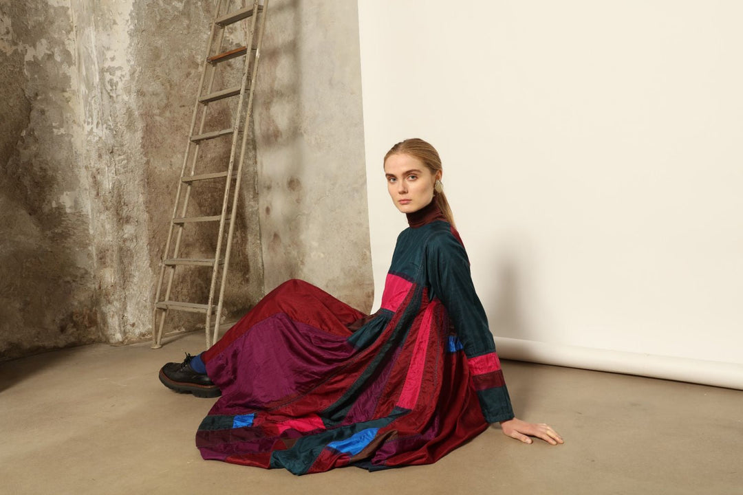 Model is wearing the Miraj 127 Silk Dress by Injiri, handwoven in India from pure silk with a fluid silhouette, soft sheen, and refined artisanal details for timeless elegance.