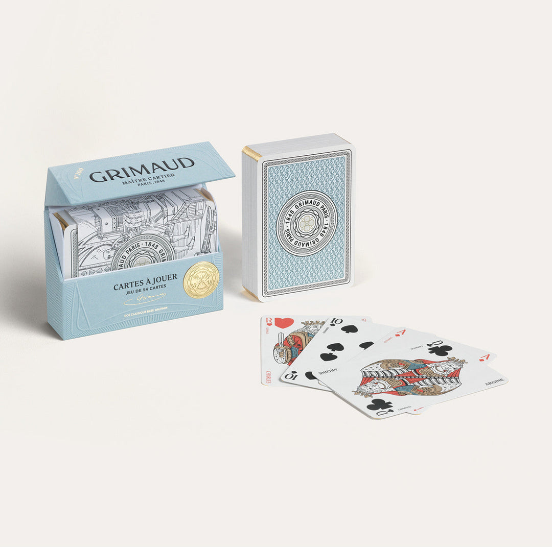 N°200 Cartes à Jouer by Grimaud Paris from the House of Nomad Stories selection, luxury Bridge and Poker playing cards in Dolphin Blue, made in France with gold foil detailing and illustrated design.