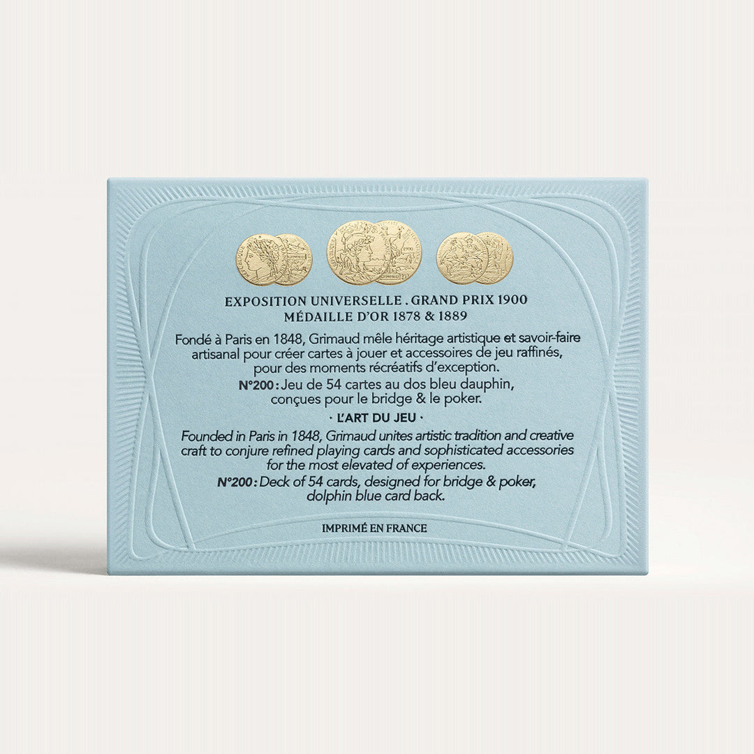 N°200 Cartes à Jouer by Grimaud Paris from the House of Nomad Stories selection, luxury Bridge and Poker playing cards in Dolphin Blue, made in France with gold foil detailing and illustrated design.