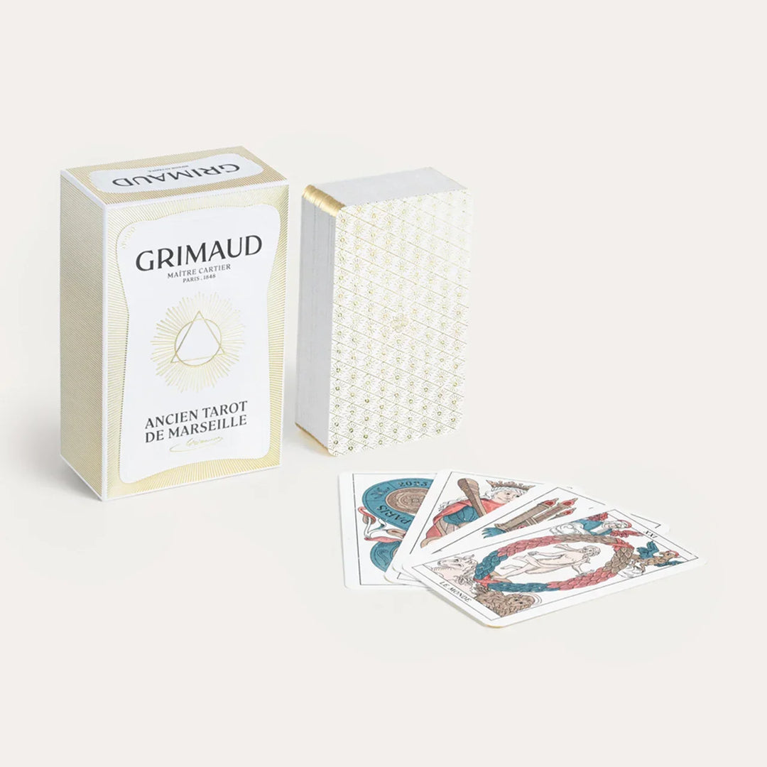 N°400 Tarot de Marseille by Grimaud Paris from the House of Nomad Stories selection, luxury 78-card tarot deck made in France with illustrated design, gold foil details and collector edition packaging.