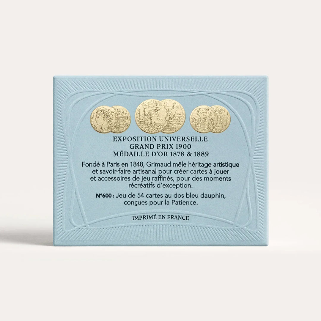 N°600 Cartes de Patience by Grimaud Paris from the House of Woven Stories selection, luxury solitaire playing cards in Dolphin Blue, made in France with gold-gilded corners and illustrated design.