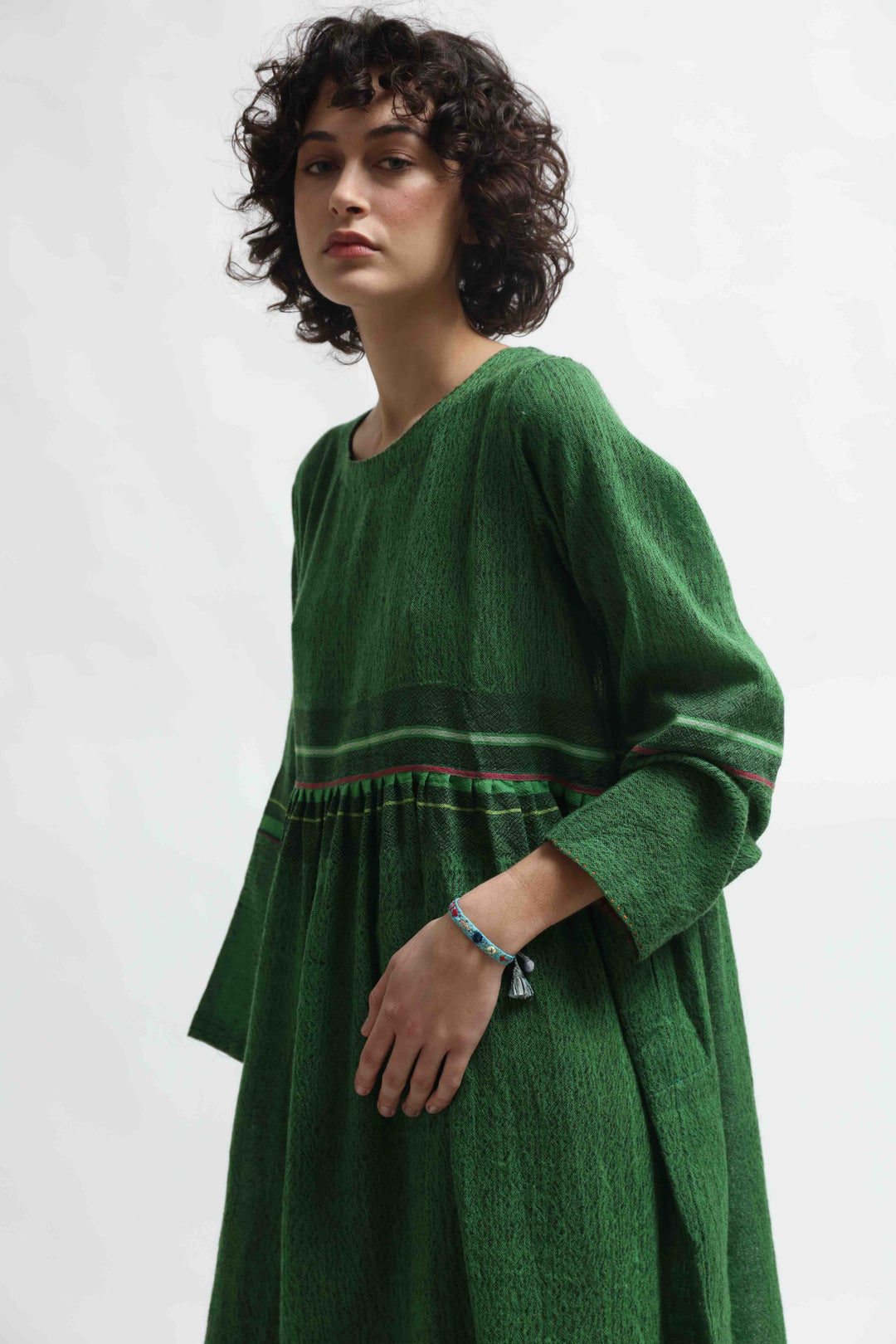 Handloomed green pure wool midi dress Rang 08 by Injiri, artisan-made in India with sustainable craftsmanship. Available at House of Nomad Stories.