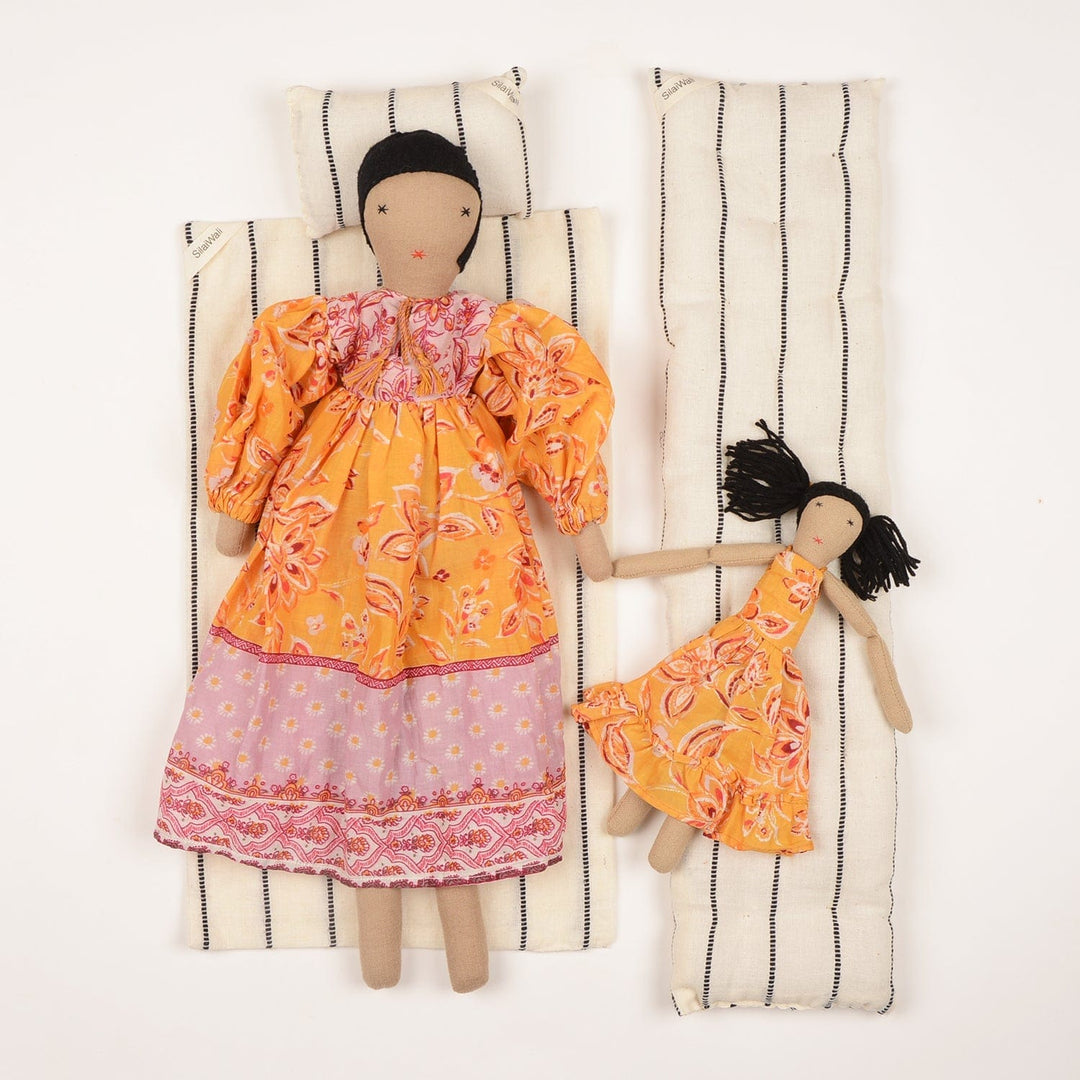 Handcrafted cloth dolls Diya and Mini by SilaiWali, mother and daughter set in traditional dresses, made from upcycled fabric. Available at House of Nomad Stories.