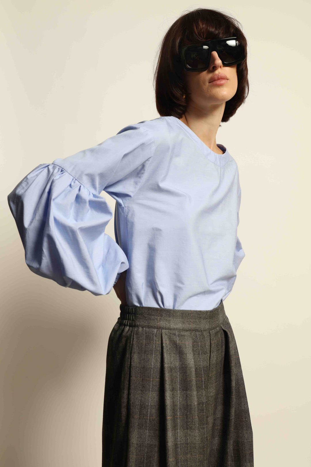 Model wearing the Sky Blue Lulu Pure Poplin Cotton Blouse with balloon sleeves by House of Nomad Stories, crafted in Italy.
