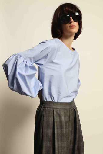Model wearing the Sky Blue Lulu Pure Poplin Cotton Blouse with balloon sleeves by House of Nomad Stories, crafted in Italy.