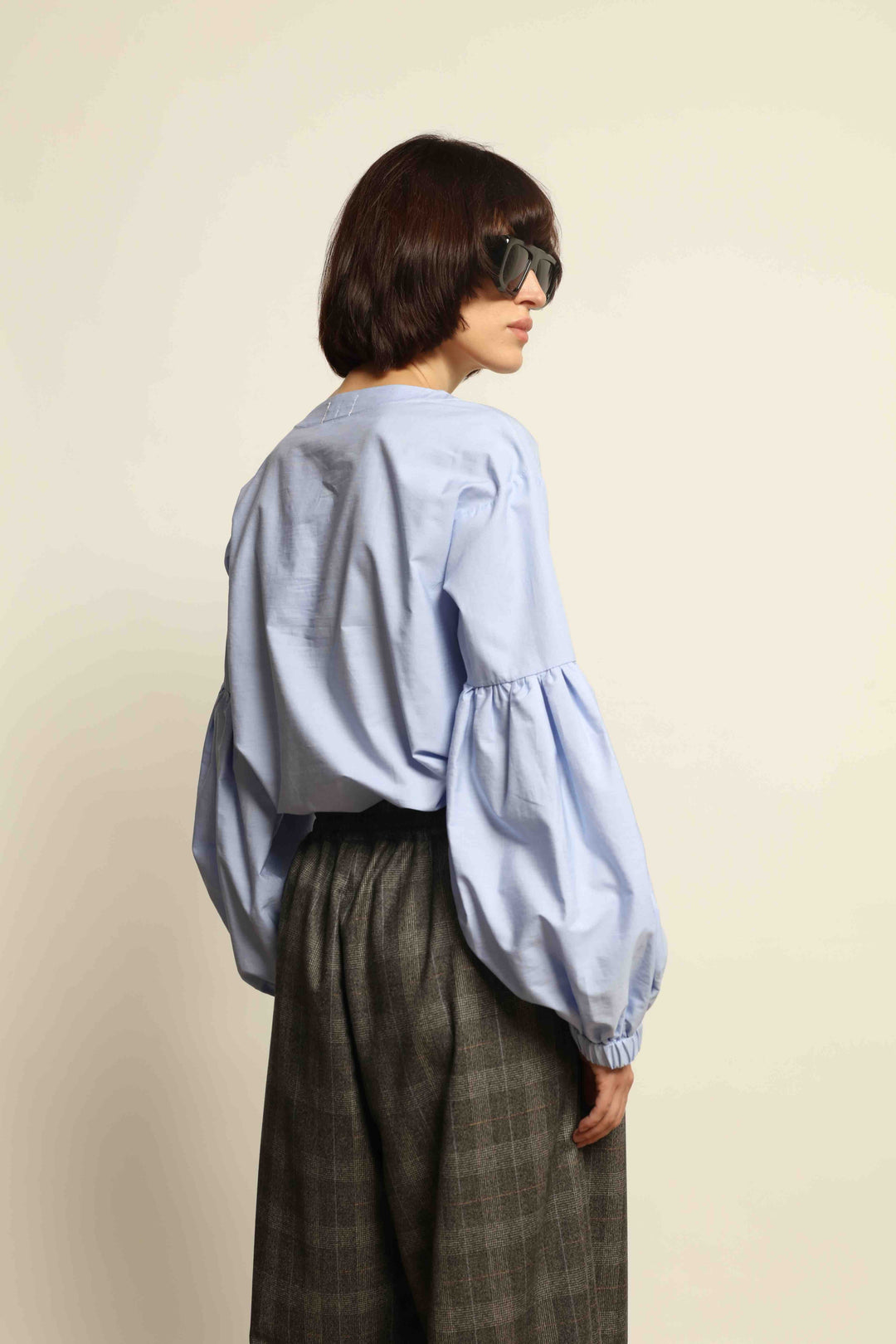 Model wearing the Sky Blue Lulu Pure Poplin Cotton Blouse with balloon sleeves by House of Nomad Stories, crafted in Italy.