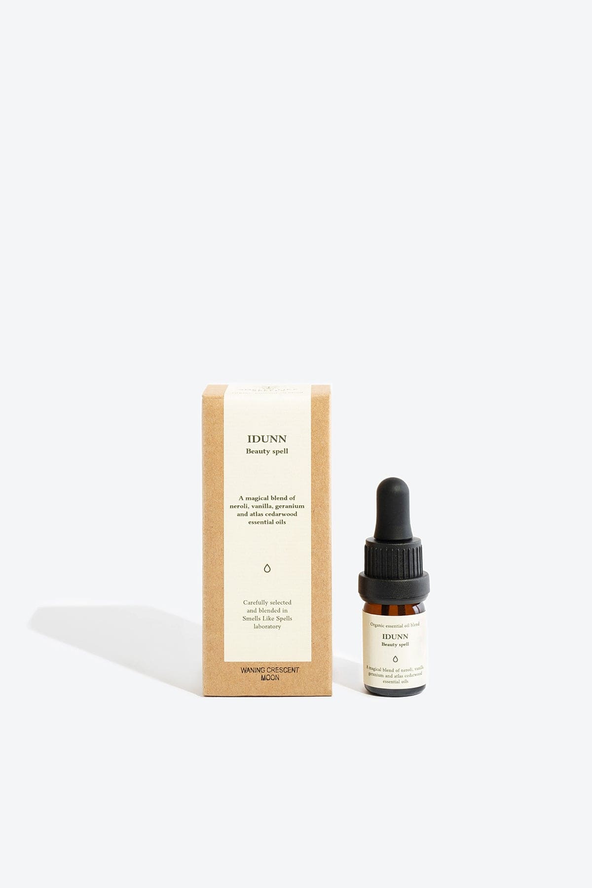 Essential organic oil blend Idunn by Smells Like Spells in amber glass bottle with dropper, natural skincare, Norse goddess of youth inspired fragrance, available at House of Nomad Stories.
