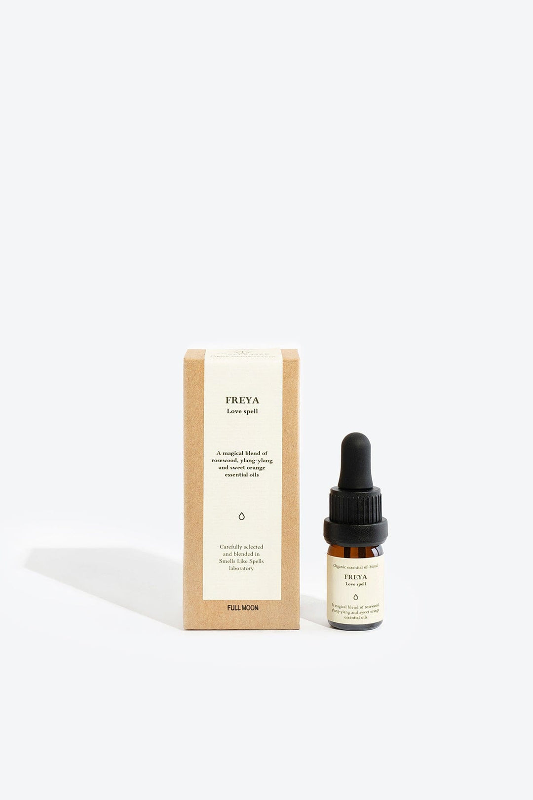 Essential Organic Oil Blend Freya by Smells Like Spells in glass bottle with wooden cap, natural handmade home fragrance for love and passion, available at House of Nomad Stories