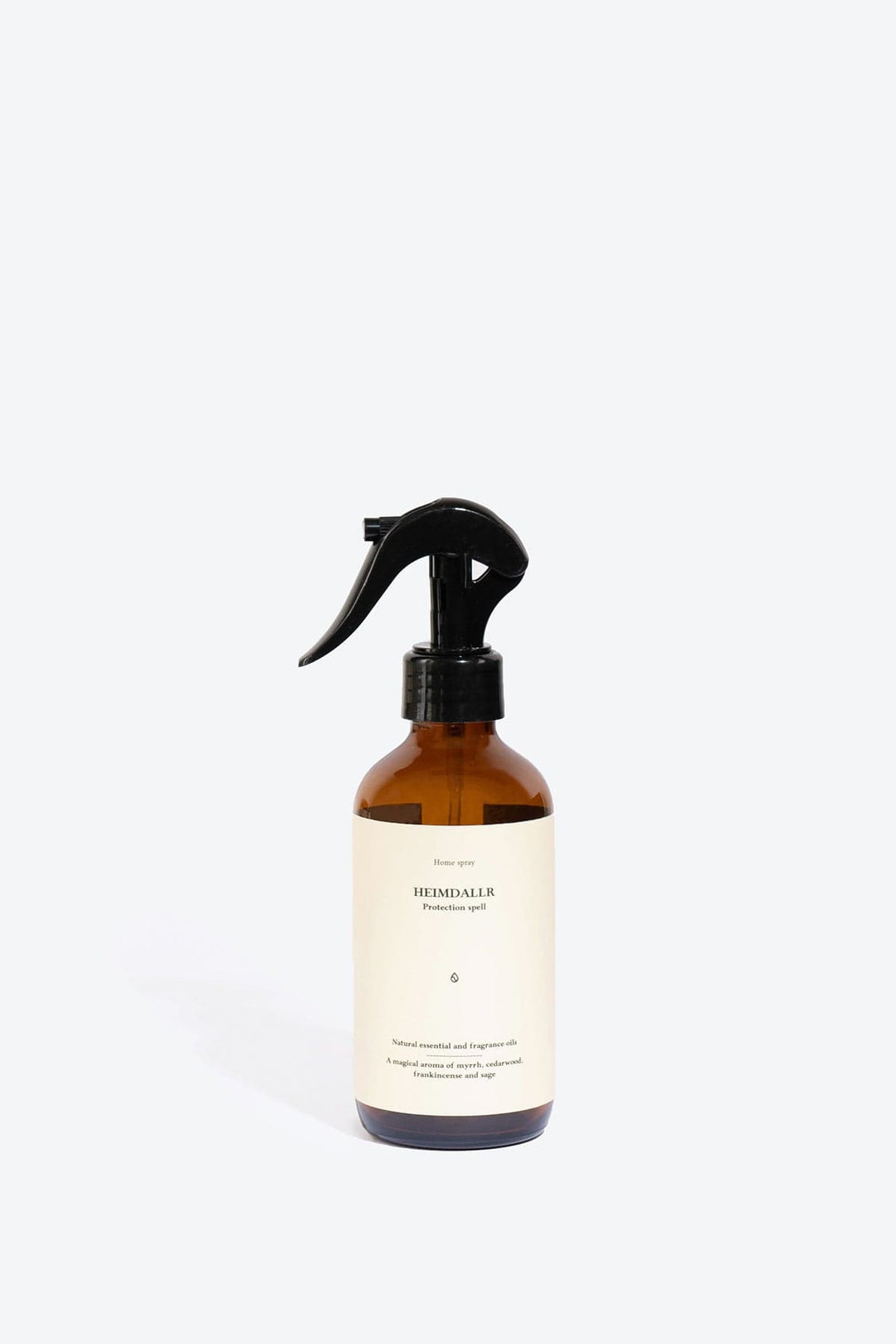 Natural Heimdallr home perfume spray by Smells Like Spells. Elegant bottle with a subtle, earthy background, evoking protection and balance through rich notes of citrus, spices, and woods.