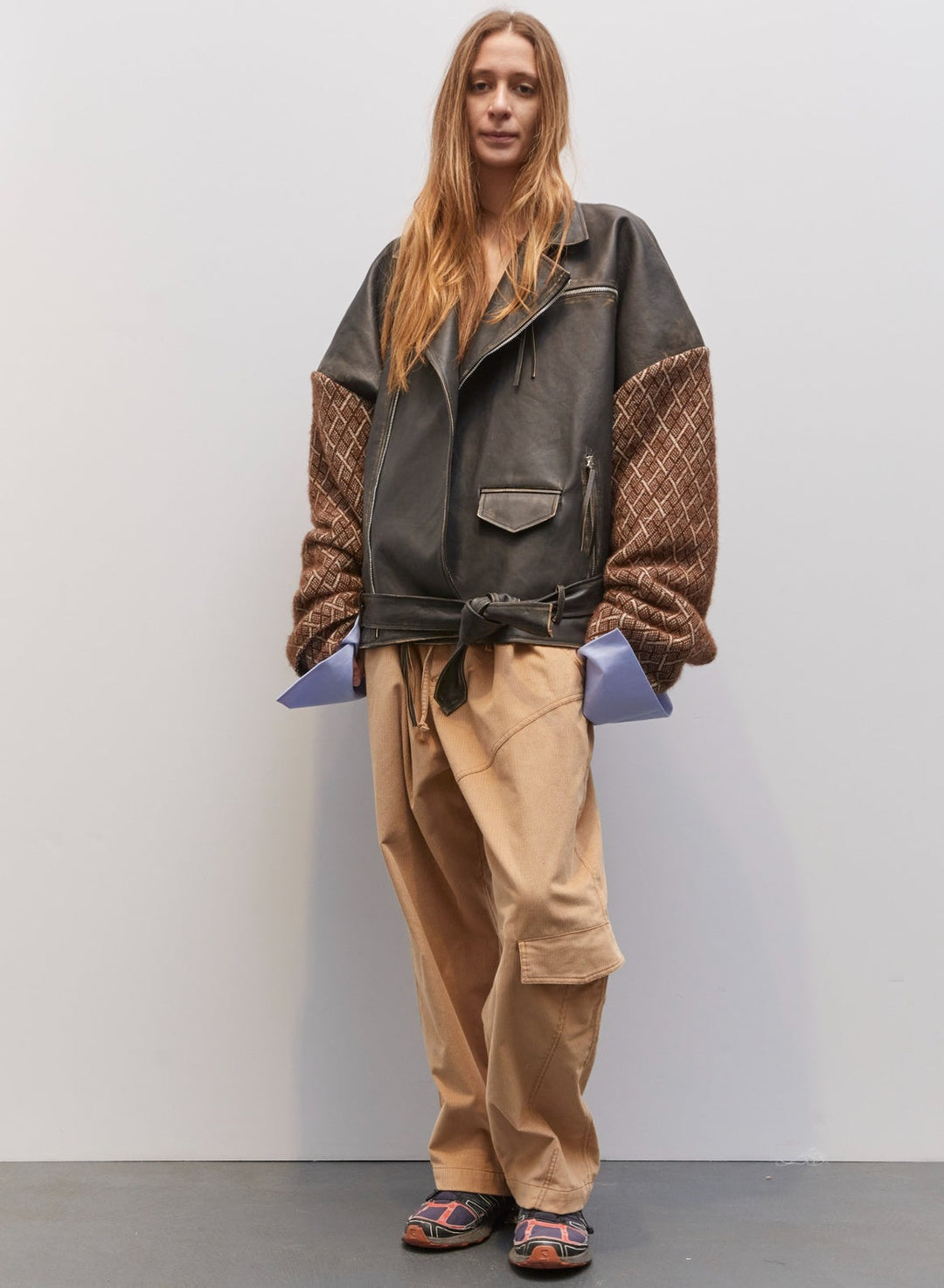 Model wearing the Tea Beige Velvet Pant by Maison Jejia, part of the House of Nomad Stories selection, in plush beige velvet with a relaxed tailored fit and soft, comfortable texture