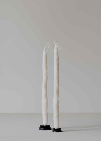 Twig Pair in Cream by Oberflacht, part of the House of Nomad Stories selection, handcrafted from beeswax and paraffin with slender organic shape and subtle variations in colour and texture.